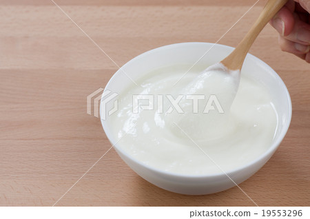 Healthy food Yoghurt spoon cupping Wood grain sideways Copy space more 19553296