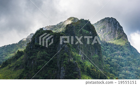 High mountain ridge in thick fog High mountain ridge in thick fog 19555151