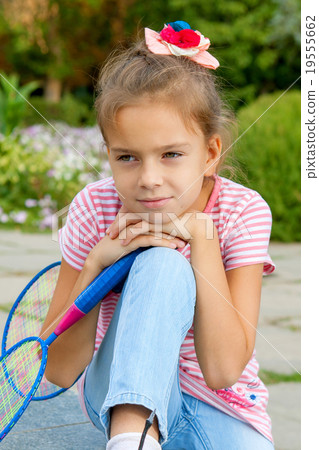 Cute girl with racket Outdoors 19555662