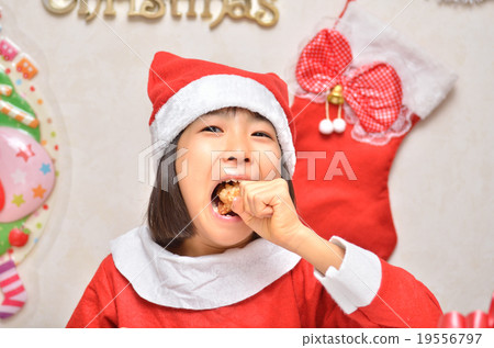 Santa Claus costume girls eating chicken 19556797