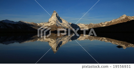 Matterhorn in a play of light and shadows Matterhorn in a play of light and shadows 19556931