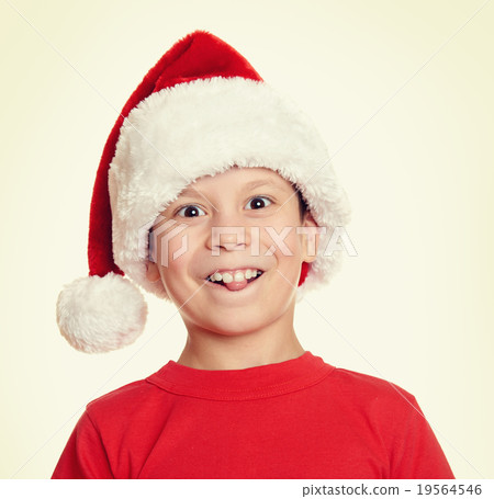 boy in santa helper hat portrait - winter holiday christmas concept boy in santa helper hat portrait - winter holiday christmas concept 19564546