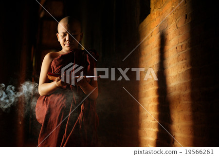 Buddhist novices learning Buddhist novices learning 19566261