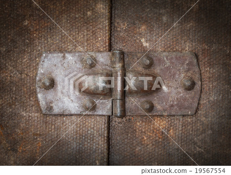 Old canvas trunk hinge close up 19567554