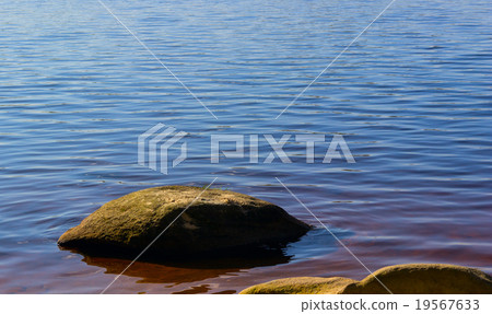 stone against water 19567633