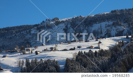 Schwendi in winter, small  village in the Alps 19568285