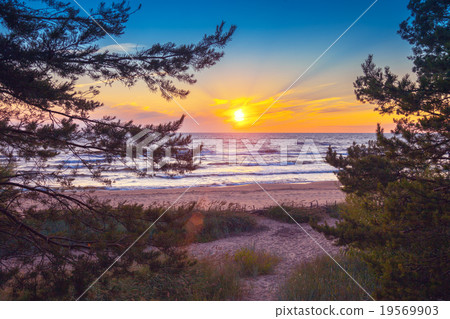 Beautiful sunset over sea 19569903