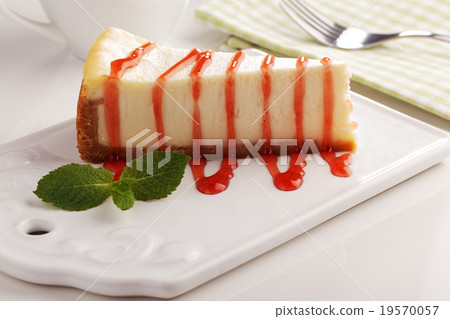 Cheesecake under strawberry sauce 19570057