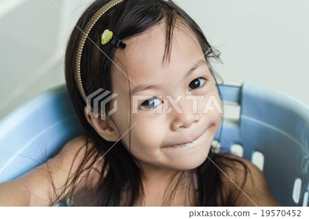 Beautiful Little Asian Girl Playing In Basket Beautiful Little Asian Girl Playing In Basket