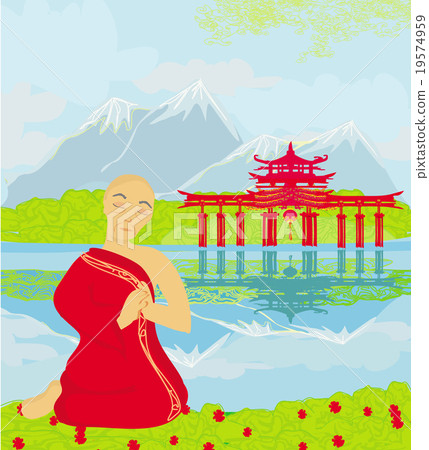 monk prays outdoors 19574959