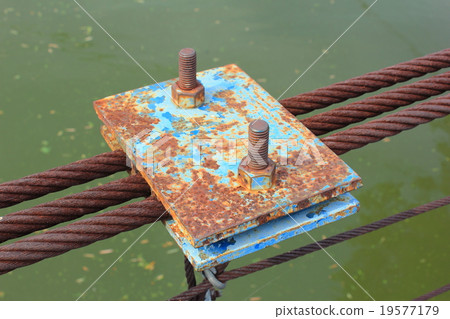 rusty wire rope sling of the part of the bridge. rusty wire rope sling of the part of the bridge. 19577179