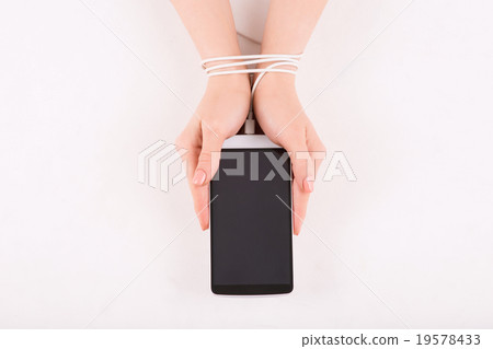 Female hands with smartphone. 19578433