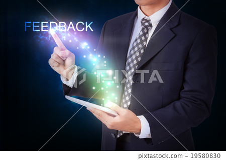Businessman holding tablet with pressing feedback 19580830