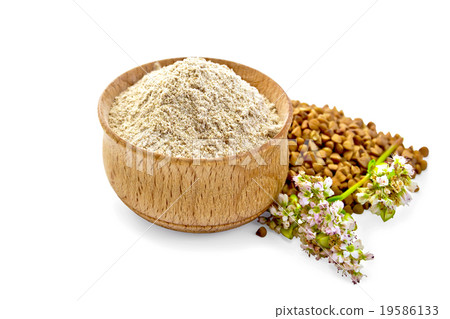 Flour buckwheat in bowl with cereals and flower 19586133