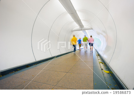 People go through underpass. People go through underpass. 19586873
