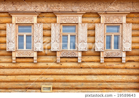 Windows on wooden house facade. Russian style Windows on wooden house facade. Russian style 19589643