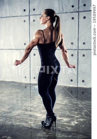 Woman bodybuilder Woman bodybuilder 19589997
