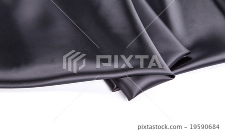 Black silk drapery. Close up. 19590684