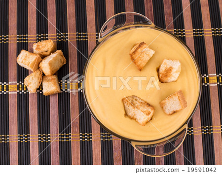 Close up of pea soup in a bowl with crouton. Close up of pea soup in a bowl with crouton. 19591042