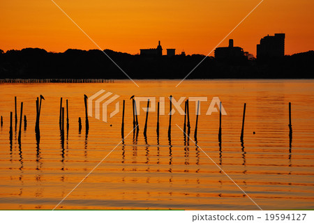 Morning lake surface stained with vermillion Morning lake surface stained with vermillion 19594127
