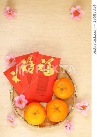 Oranges and red packets for Chinese New year Oranges and red packets for Chinese New year 19595314