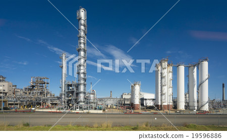 Oil refinery against blue sky Oil refinery against blue sky 19596886