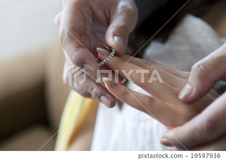 Hands to receive the ring Hands to receive the ring 19597936
