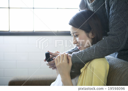 A woman receiving a ring A woman receiving a ring 19598096