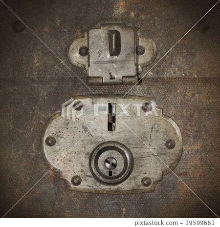 Old canvas trunk lock close up 19599661