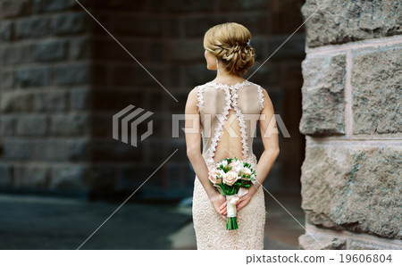 Bride with wedding bouquet Bride with wedding bouquet 19606804