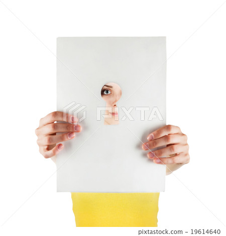 Girl looking through a keyhole Girl looking through a keyhole 19614640