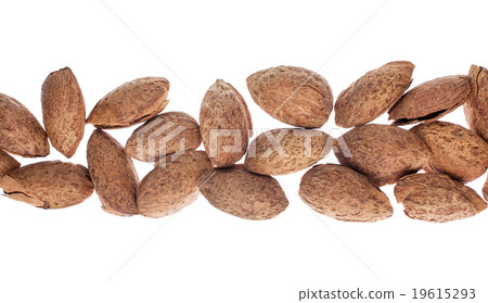 Almonds, isolated on a white background Almonds, isolated on a white background 19615293