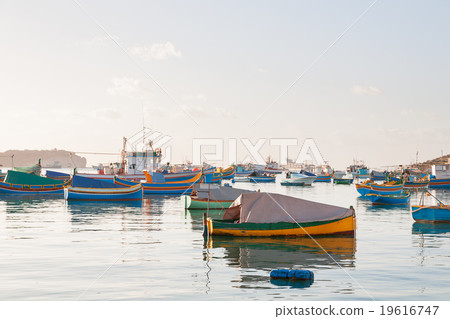 Colorful traditional boats, Marsaxlokk, Malta. 19616747