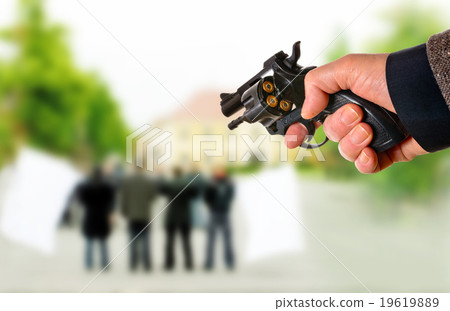 Stock Photo: a killer points on the political meeting