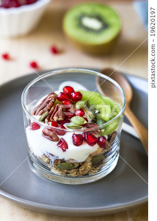 Granola with Greek yogurt ,Kiwi and Pomegranate Granola with Greek yogurt ,Kiwi and Pomegranate 19620197