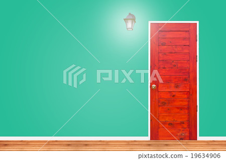 Wooden door and lamp with green vintage wall. 19634906