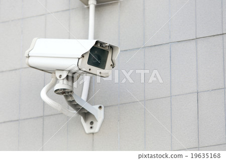 CCTV camera on the wall high building. CCTV camera on the wall high building. 19635168