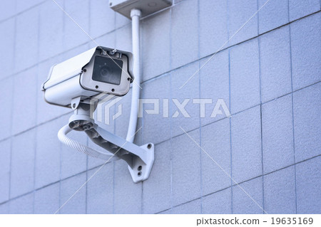 CCTV camera on the wall high building. CCTV camera on the wall high building. 19635169