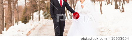 bride and groom in the winter woods bride and groom in the winter woods 19635994