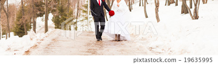 bride and groom in the winter woods bride and groom in the winter woods 19635995