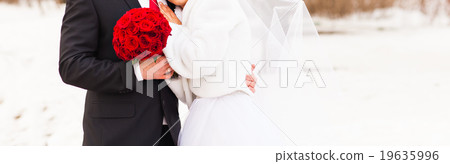 bride and groom in the winter woods bride and groom in the winter woods 19635996