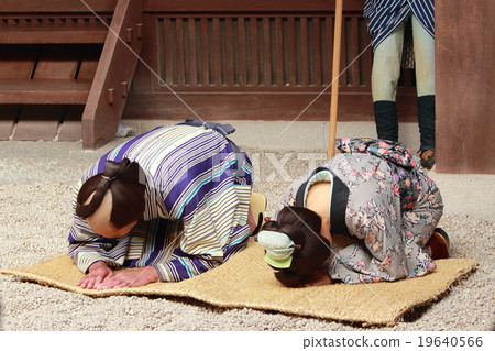 Townspeople bowing at a magistrate place Townspeople bowing at a magistrate place 19640566