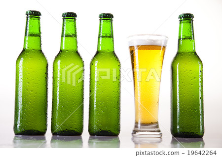 Beer bottle and glass, bright vibrant alcohol Beer bottle and glass, bright vibrant alcohol 19642264