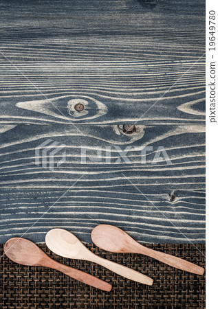 Wooden Spoons on Blue Wooden Background Wooden Spoons on Blue Wooden Background 19649780