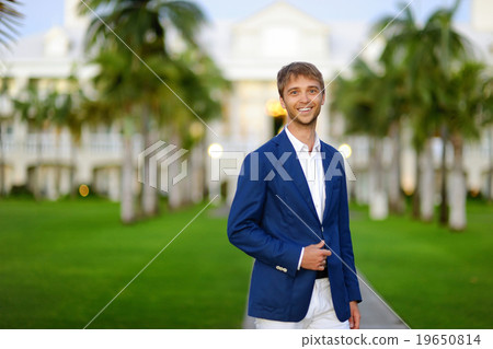 Young handsome man portrait outdoors 19650814