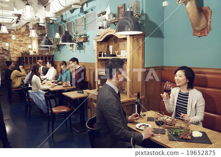 Dinner at a stylish restaurant 19652875