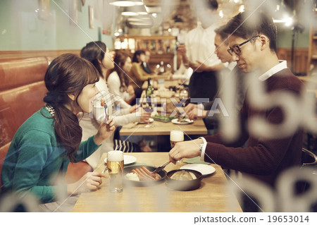 Dinner at a stylish restaurant 19653014