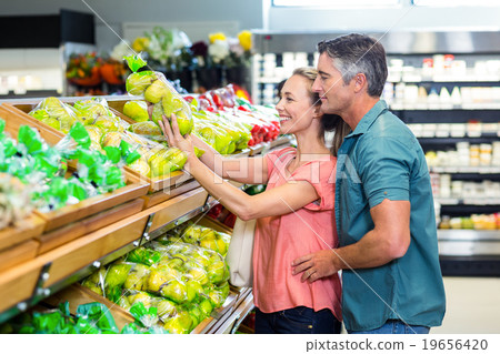 Happy couple at the supermarket 19656420