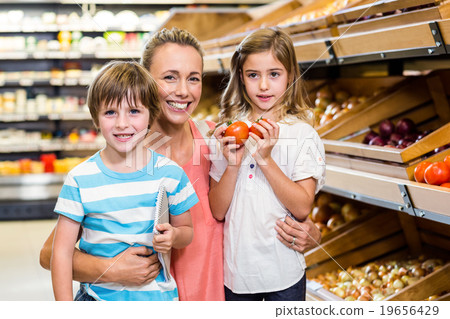 Young family doing some shopping Young family doing some shopping 19656429