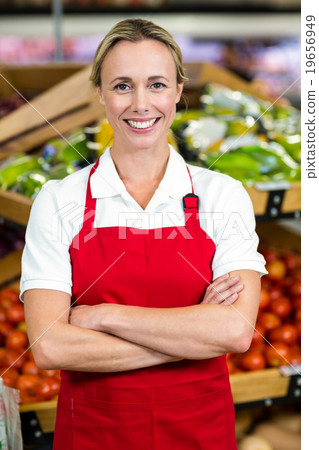 Portrait of smiling woman wearing apron  19656949